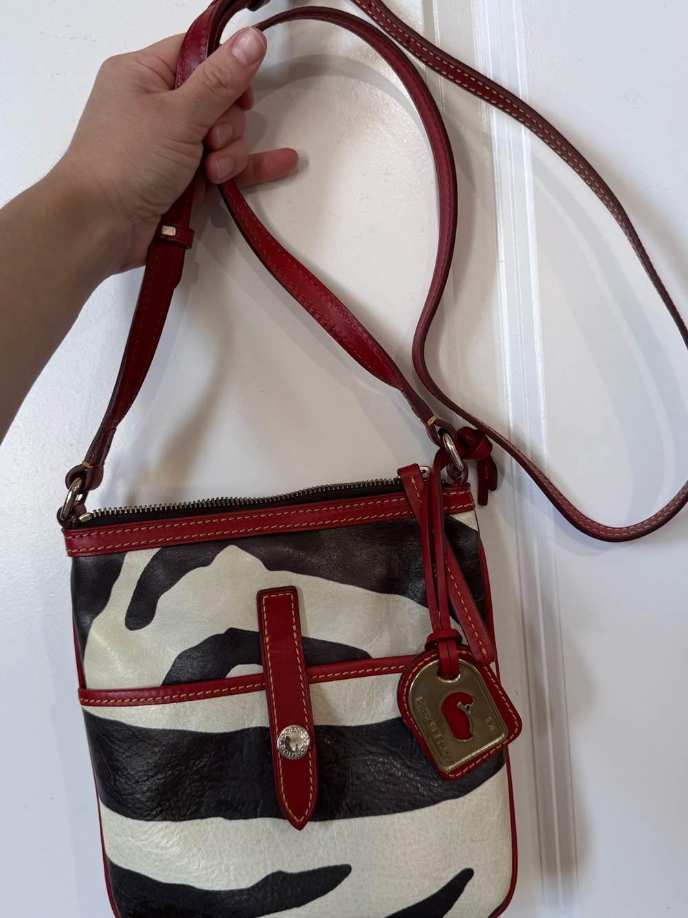 Dooney & Bourke Black and White Zebra Crossbody with Red Trim